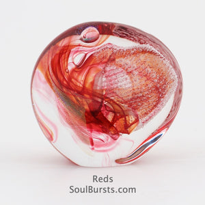 Soulbursts Looking glass in Reds with cremation ashes